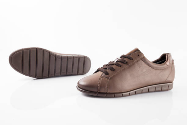 istock Male brown leather shoe on white background. 866083782