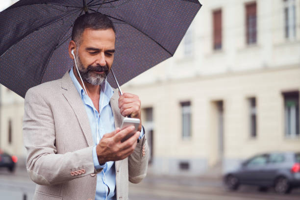 istock Rainy business day for man 866084616