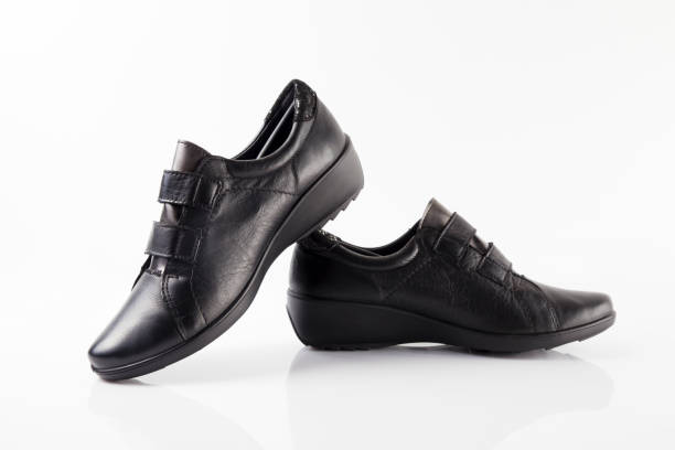 istock Male black leather shoe on white background 866087770