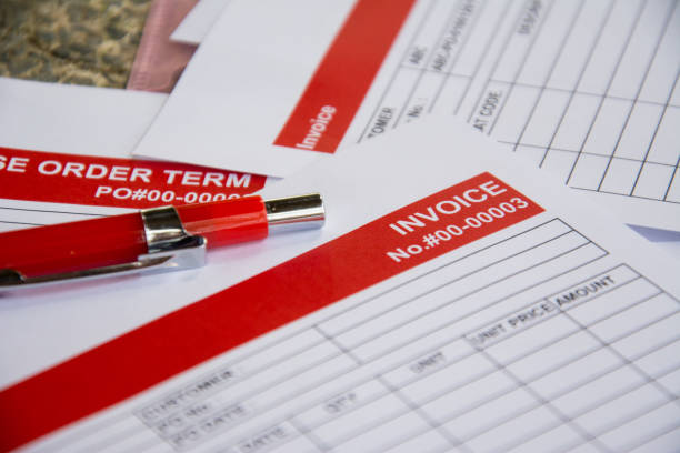 istock the red pencil put on the invoice red tab paper close up background 866094600