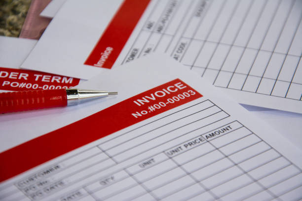 istock the red pencil put on the invoice red tab paper close up background 866095060