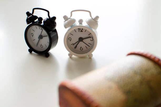 istock Alarm clock friends situation 866095798