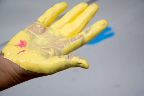 istock Hand make a trace colorful symbol on white paper background 866096228