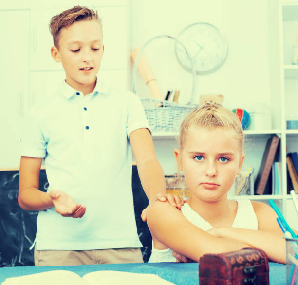 istock Brother is asking forgiveness from his offendedly sister 866097030