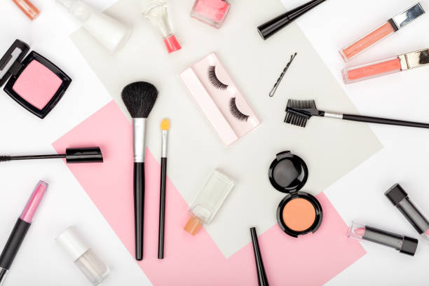 istock set of professional decorative cosmetics, makeup tools and accessory on white background. beauty, fashion, party and shopping concept. trendy flat lay composition, top view 866100344