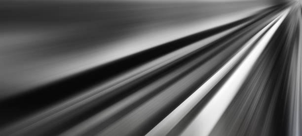 istock Horizontal wide vibrant black and white road to success perspect 866100704