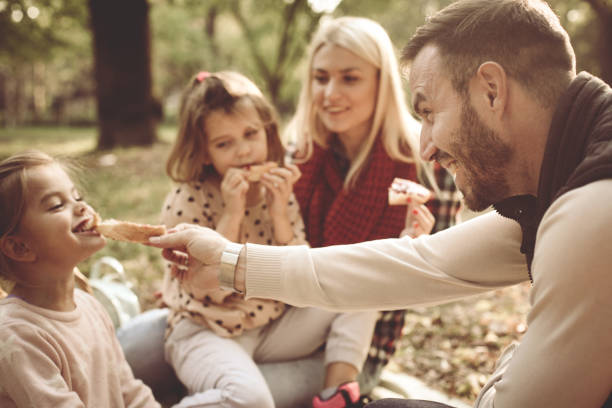 istock Family having picnic in park. 866104052