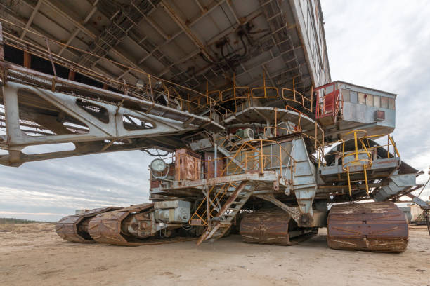 istock Ladder for lifting a giant mining excavator 866106646