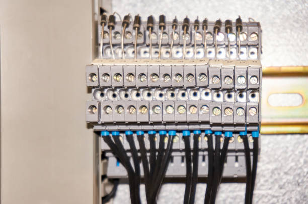 istock Terminal blocks for electrical connection and earthing terminals for grounding in the control cubicle. 866107028