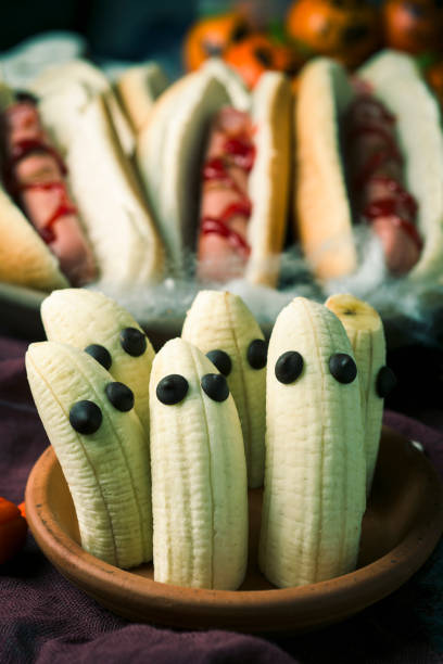 istock funny halloween food on a rustic table 866107216
