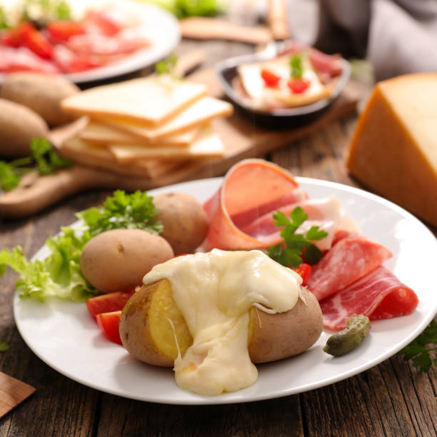 istock cheese raclette with potato and ham 866108318