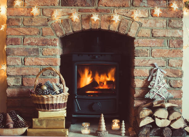 fondo de ambiente de navidad - fireplace christmas candle holiday fotografías e imágenes de stock