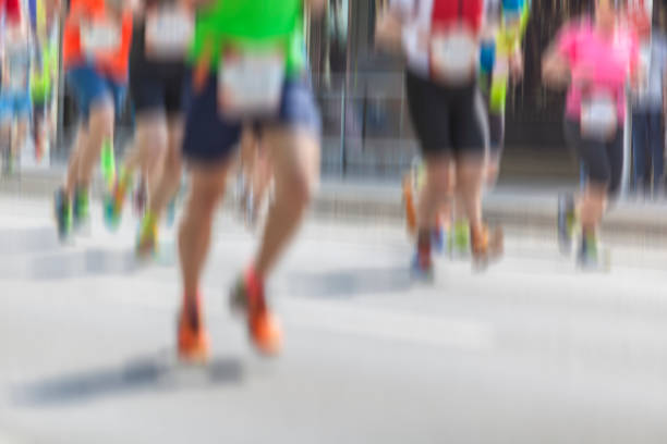 istock marathon runners in the city background 866111896
