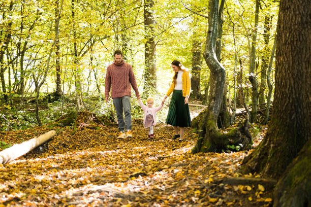 istock Parents walking with their holder and holding hands 866118814