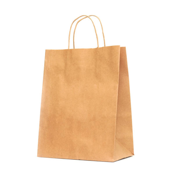 白い背景の上リサイクル紙ショッピング バッグ。 - paper bag bag brown handle ストックフォトと画像