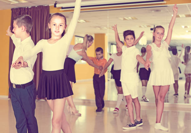 istock Children are dancing twist in pairs 866123562