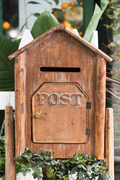 istock Wooden letter box with plants 866124318