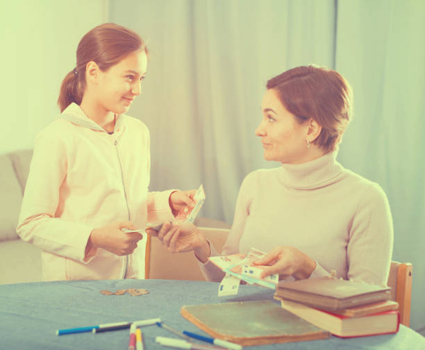 istock Daughter asks cash from mother 866132510