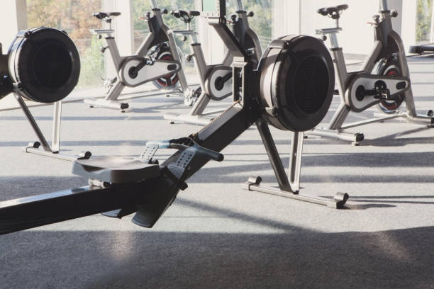 istock Modern gym interior with equipment, fitness leg exercise machine 866138974