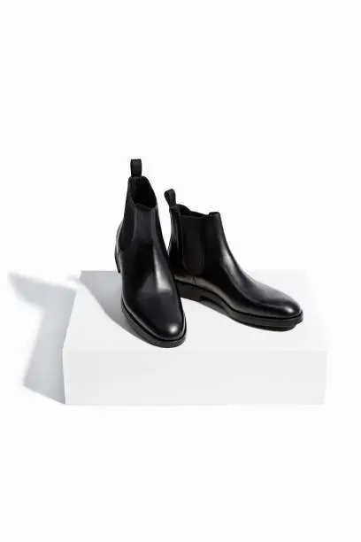 Black leather flat boots isolated on white background ( with clipping path)