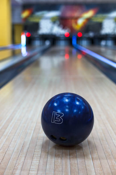 istock Bowling ball closeup on lane background 866146040