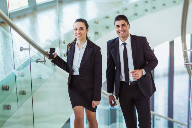 istock Business colleagues talking on stairs 866146196