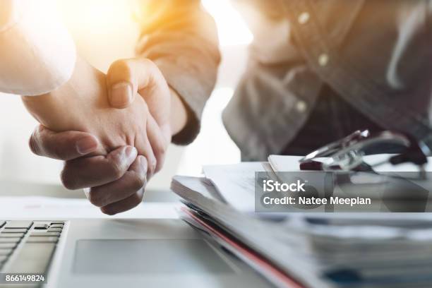 Close Up Of Business People Shaking Hands Finishing Up Meeting Business Etiquette Congratulation Merger And Acquisition Concept Stock Photo - Download Image Now