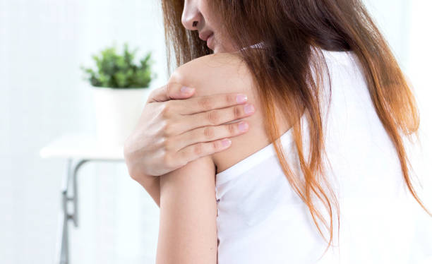 istock young suffering from shoulder pain in bedroom 866150512