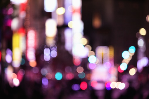 Night city lights - defocused Tokyo, Japan. Blurred neons.