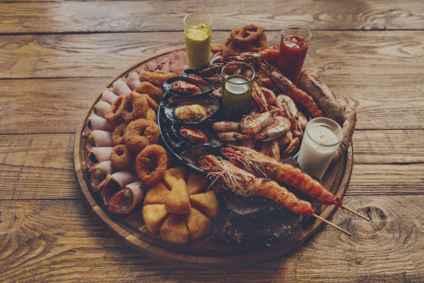 istock Seafood platter on wooden table background 866154016