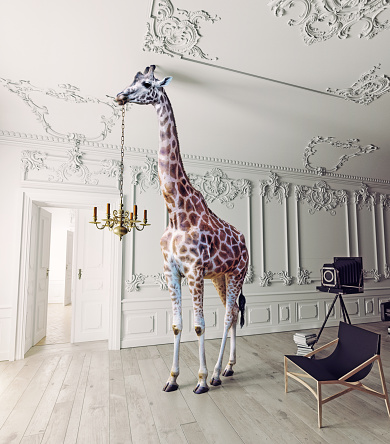 the giraffe hold the chandelier in the luxury decorated interior