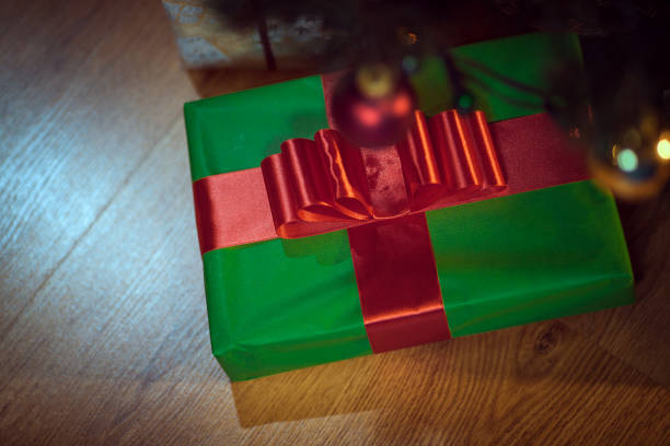 istock Wrapped Christmas presents under a Christmas tree 866155038