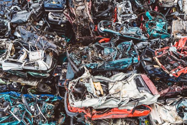 istock Old rusty corroded cars in car scrapyard. 866155832
