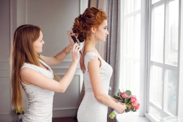 Bride's hairstyle preparation stock photo