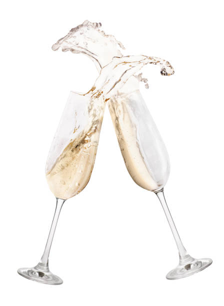 istock glasses of champagne with splash 866158782