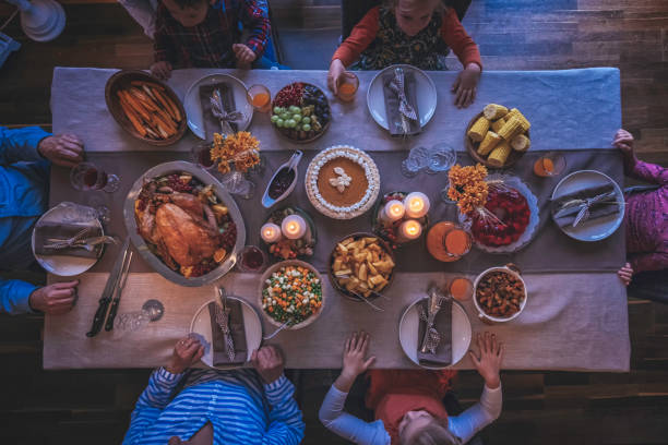 istock Family Having Traditional Holiday Stuffed Turkey Dinner 866161786