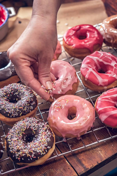 istock Preparing Homemade Donuts with Icing and Chocolate 866161850
