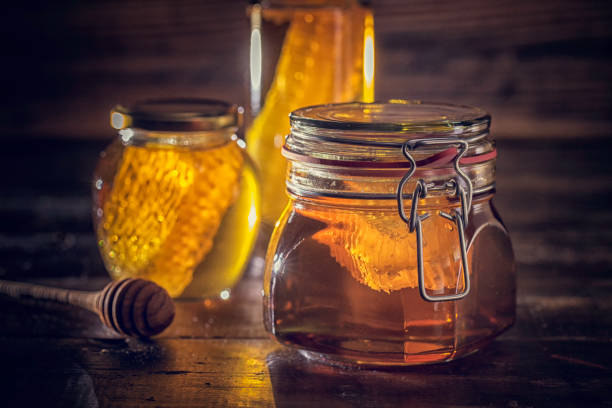 istock Honey with Honeycombs in a Jar 866161872