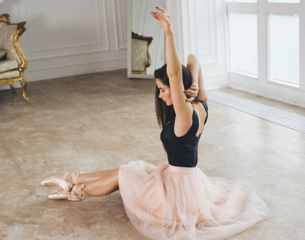 istock ballerina in pink shirt do exercise 866162066