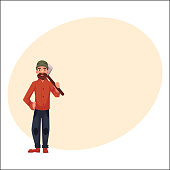 istock Lumberman, lumberjack, woodcutter standing and holding an axe 866165886