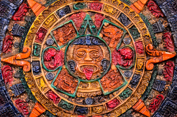 Typical Colored Clay Maya Calendar Typical Colored Clay Maya Calendar Isolated on Blackbackground calendar 2012 stock pictures, royalty-free photos & images