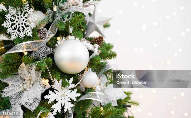 Decorated Christmas Fir Tree On Abstract Sparkling Background With Copyspace Stock Photo - Download Image Now