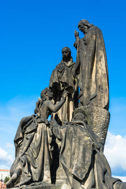 istock Statues of Saints Cyril and Methodius on Charles Bridge in Prague 866168514