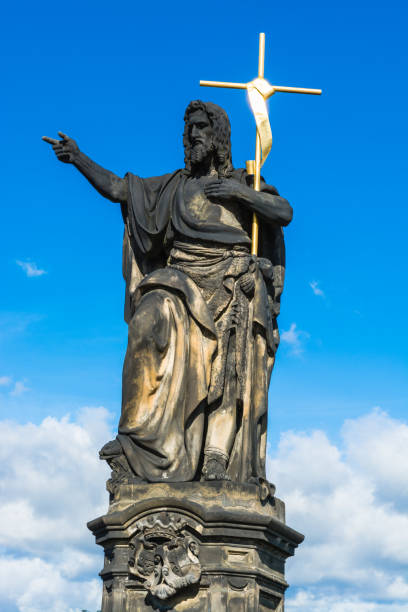istock Statue of John the Baptist on Charles Bridge in Prague 866168872