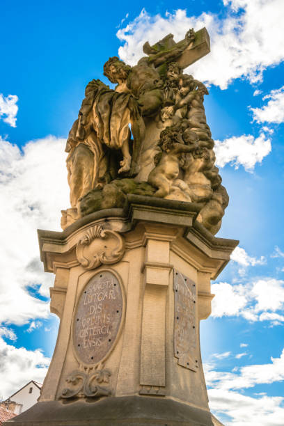 istock Statue of Lutgardis on Charles Bridge in Prague 866168930