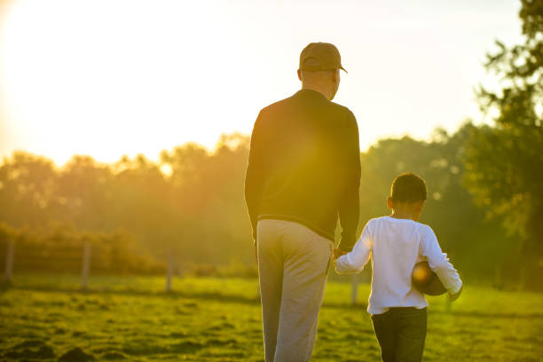 istock I love to walk with my father 866175744