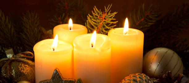 istock Four burning advent candles and Christmas decoration 866183070