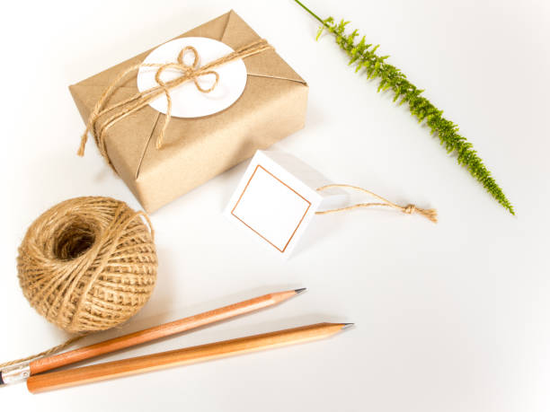 istock Gift box wrapped in kraft paper and rustic hemp as natural rustic style 866190436