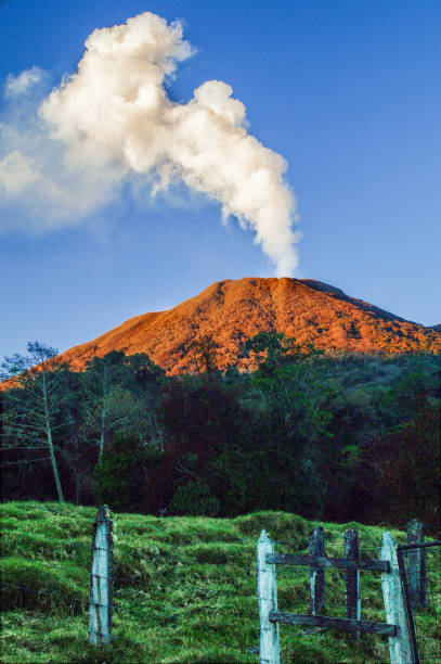 Turrialba Volcano eruption Turrialba Volcano during eruption costa rican sunset stock pictures, royalty-free photos & images