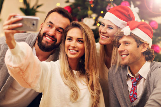 istock Group of friends having fun during Christmas 866195310